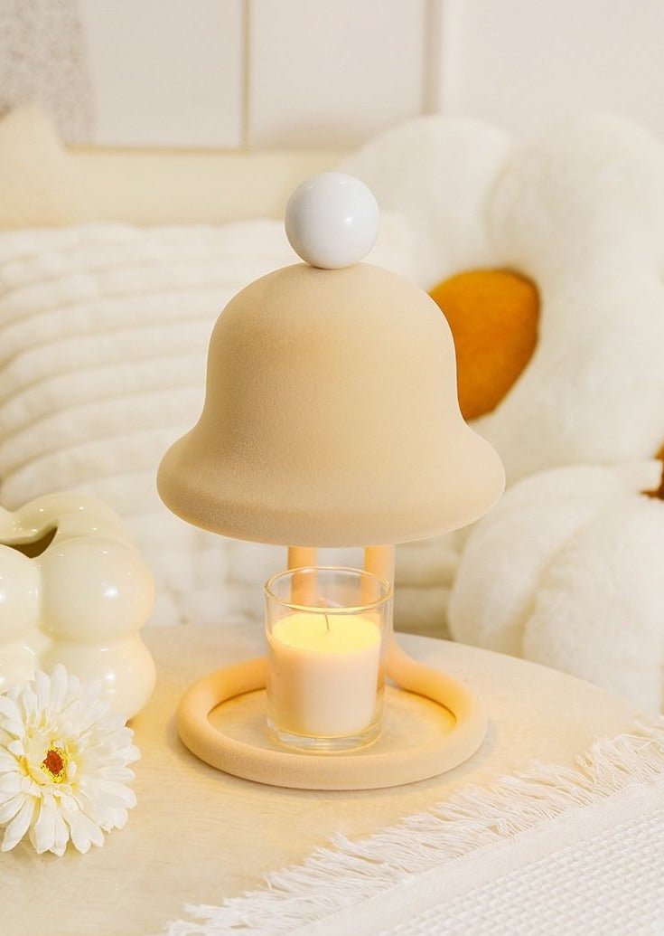 Cute whimsical bell candle warmer lamp designed for large candles, featuring a playful bell shape and warm light.