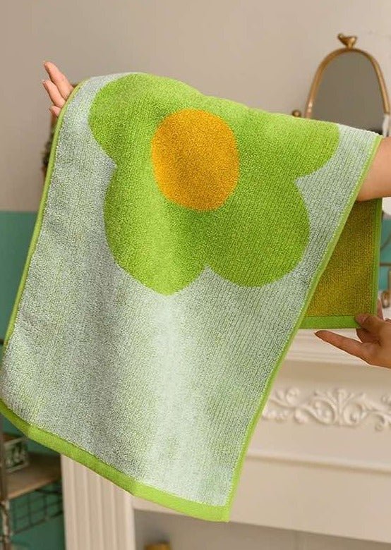 Cute Whimsical Sunflower Bath Towel featuring vibrant sunflower prints on soft cotton fabric.