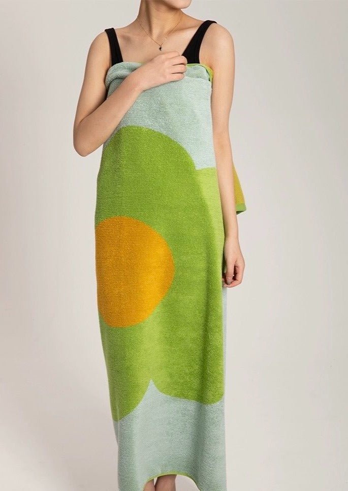 Cute Whimsical Sunflower Bath Towel featuring vibrant sunflower prints on soft cotton fabric.