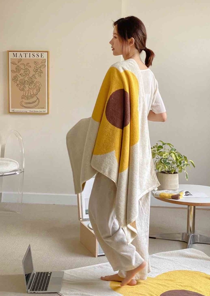 Cute Whimsical Sunflower Bath Towel featuring vibrant sunflower prints on soft cotton fabric.