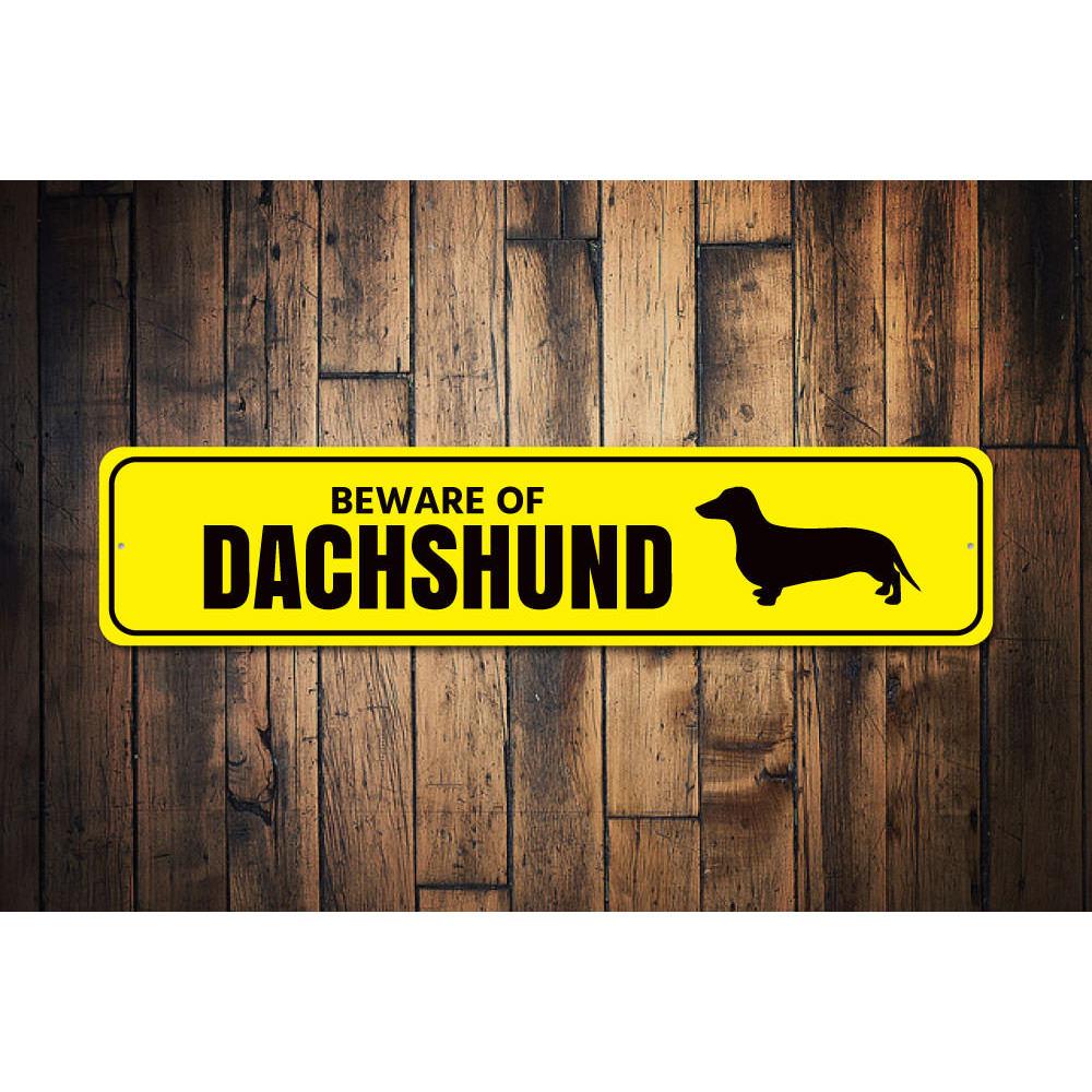 Dachshund Danger Sign made of high-quality aluminum, featuring a playful design perfect for dog lovers.