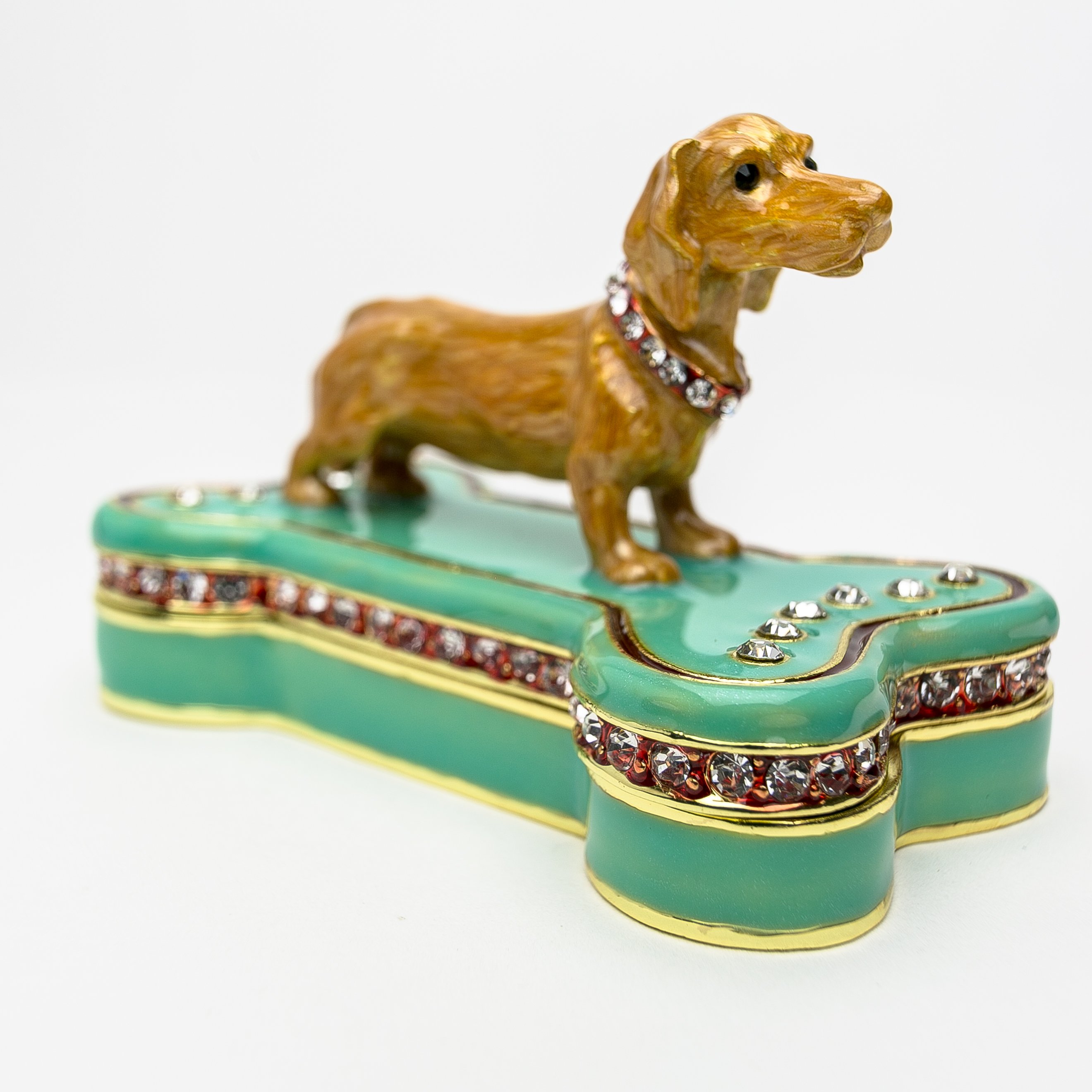 Handmade trinket box featuring a Dachshund dog sitting on a bone, adorned with Austrian crystals and 925 silver plating.