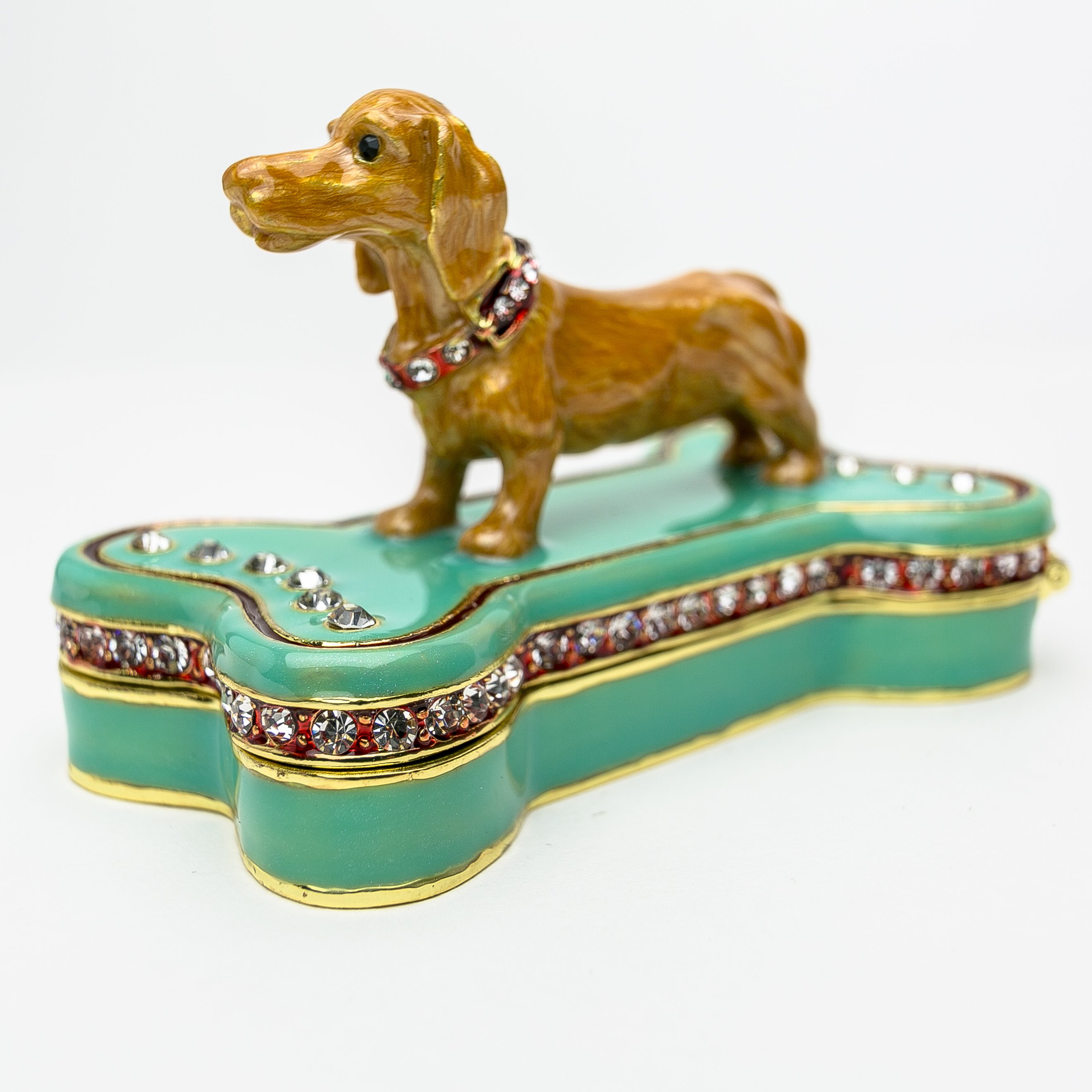 Handmade trinket box featuring a Dachshund dog sitting on a bone, adorned with Austrian crystals and 925 silver plating.