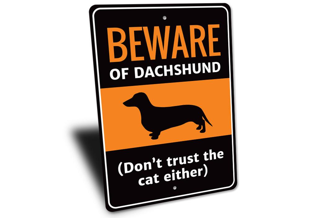 A decorative aluminum sign featuring a charming Dachshund design, perfect for home decor.