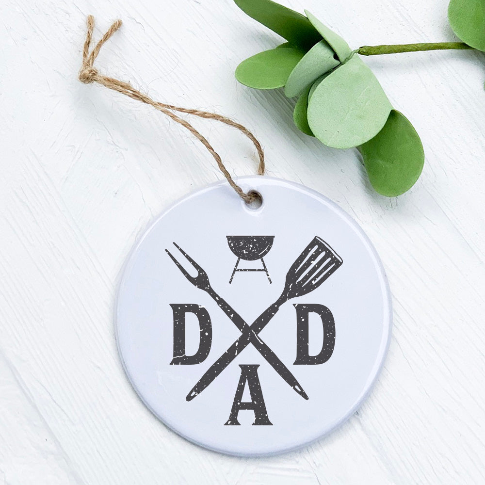 A beautifully crafted porcelain ornament featuring a spatula and fork design, perfect for gifting or home decoration.