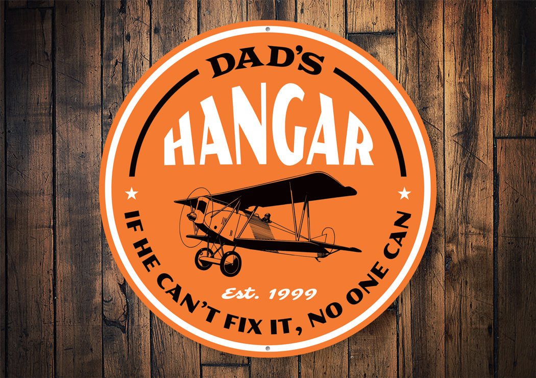 Dad's Hangar Est Year Aviation Sign made of high-quality aluminum, featuring customizable text and pre-drilled holes for easy mounting.