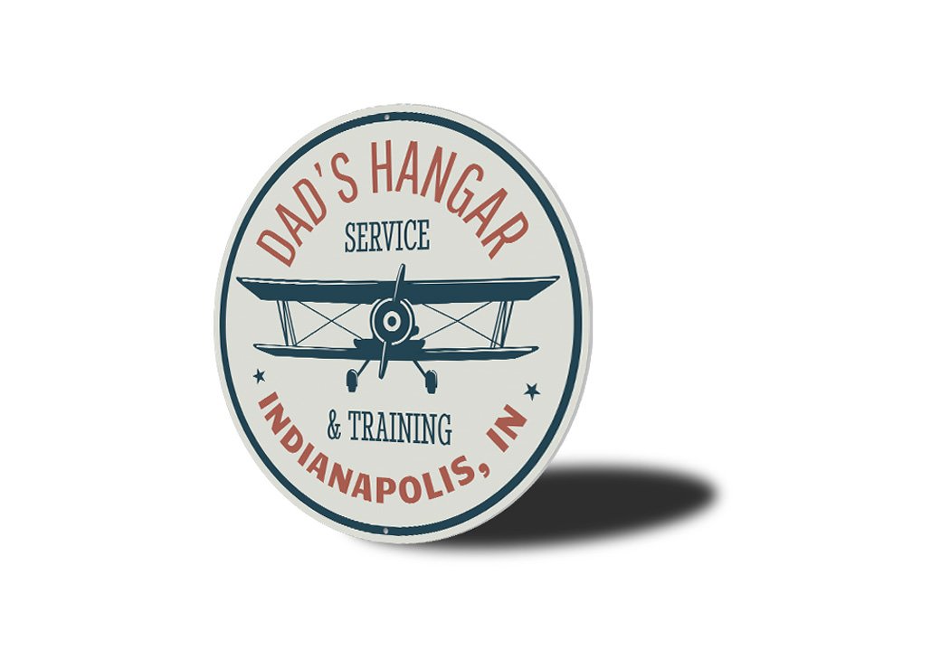 Dad's Hangar Service and Training City State Sign made of durable aluminum, featuring customizable text and pre-drilled holes for easy mounting.