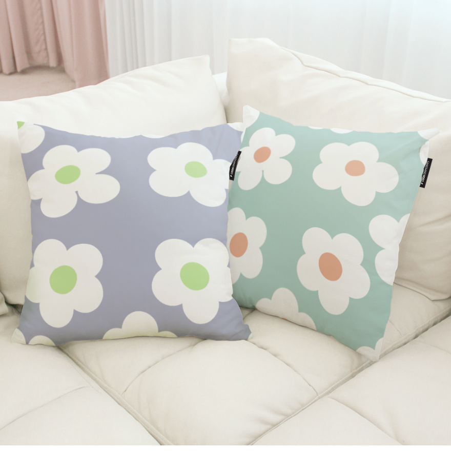 Daisy Dream double-sided cushion showcasing its stylish design and high-quality microfiber material.