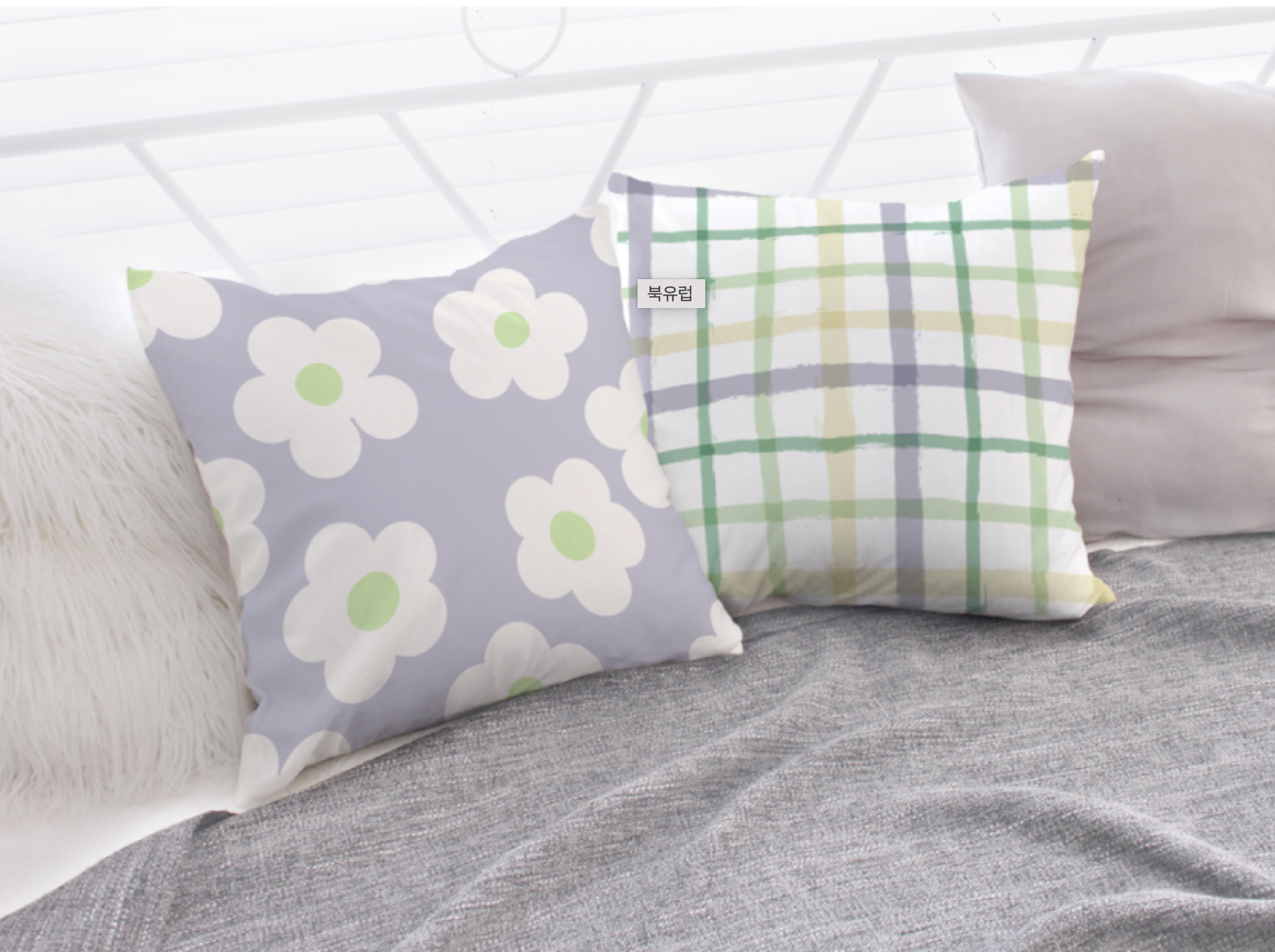 Daisy Dream double-sided cushion showcasing its stylish design and high-quality microfiber material.