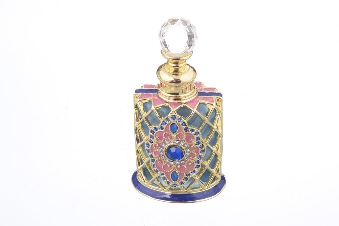 A beautifully decorated perfume bottle with enamel painting and Austrian crystals, showcasing intricate craftsmanship and luxurious gold plating.