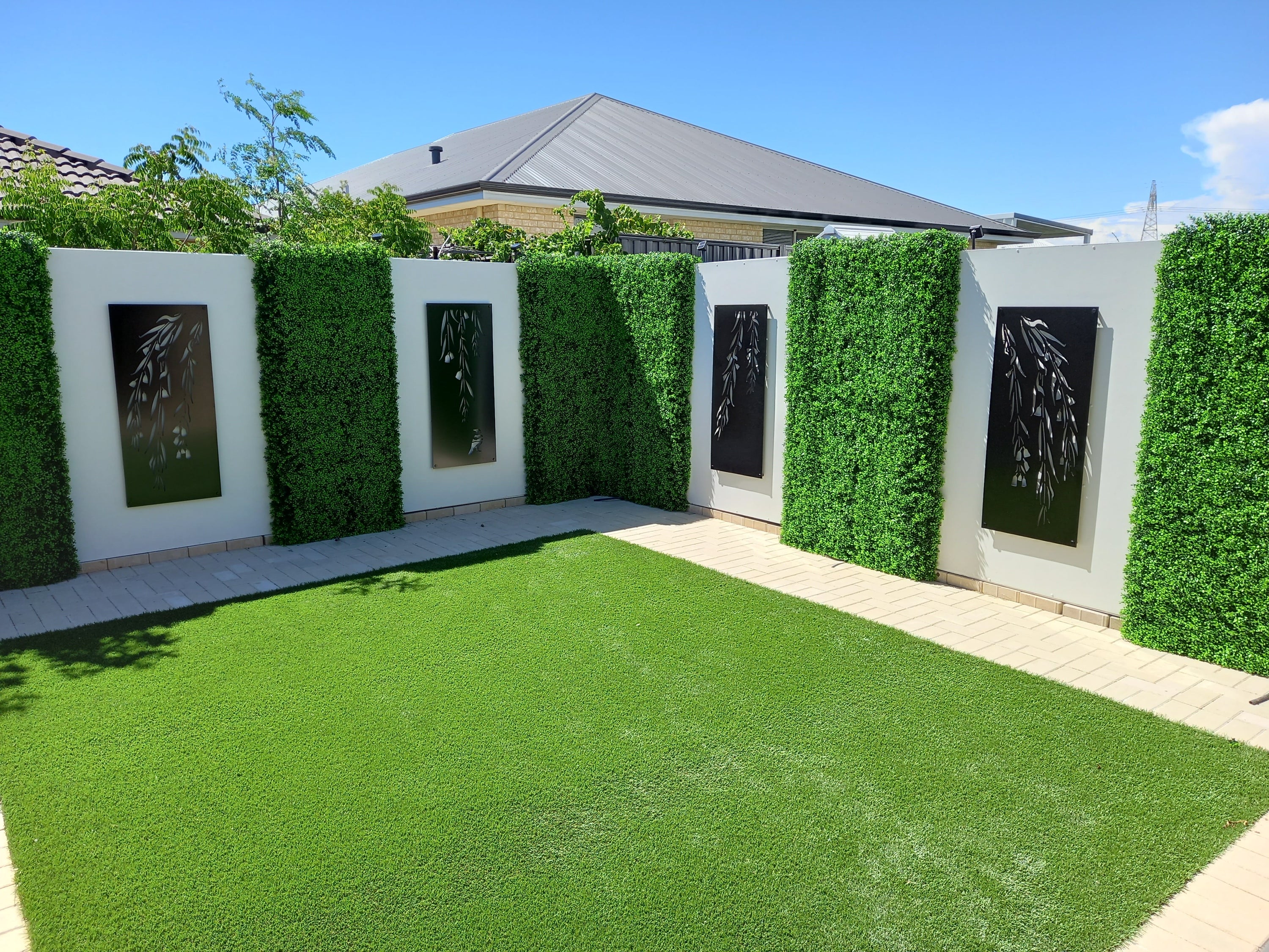 Dense Buxus Artificial Hedge Tile showcasing realistic green foliage, perfect for creating privacy and enhancing outdoor spaces.