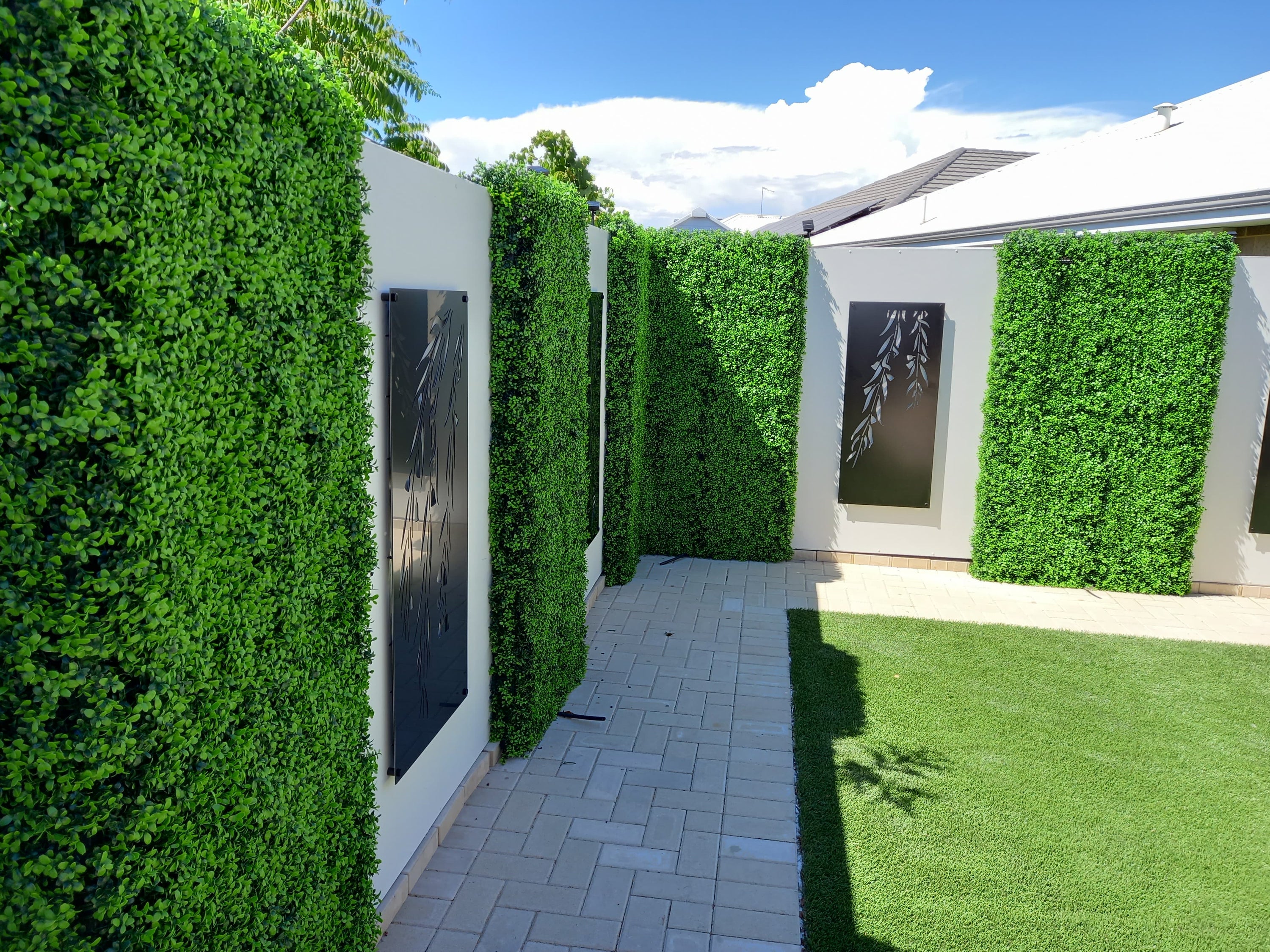 Dense Buxus Artificial Hedge Tile showcasing realistic green foliage, perfect for creating privacy and enhancing outdoor spaces.