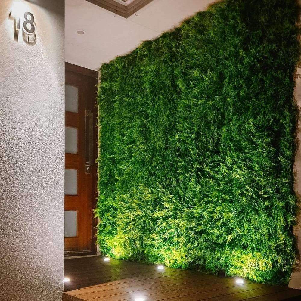 Dense Fern Artificial Hedge panel showcasing realistic green foliage, perfect for creating a lush vertical garden.