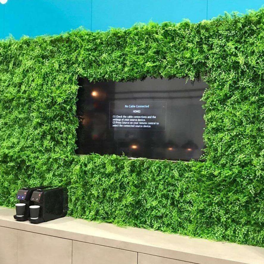 Dense Fern Artificial Hedge panel showcasing realistic green foliage, perfect for creating a lush vertical garden.