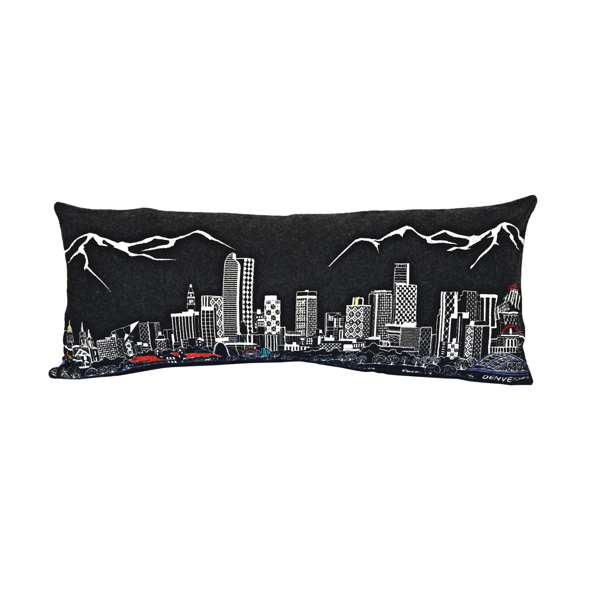 Denver Pillow featuring intricate embroidery of city highlights with a stylish red zipper at the bottom, made from wool and nylon.