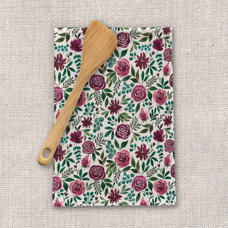 Deep magenta floral eucalyptus tea towel made of cotton twill, featuring a vibrant design and hemmed edges.