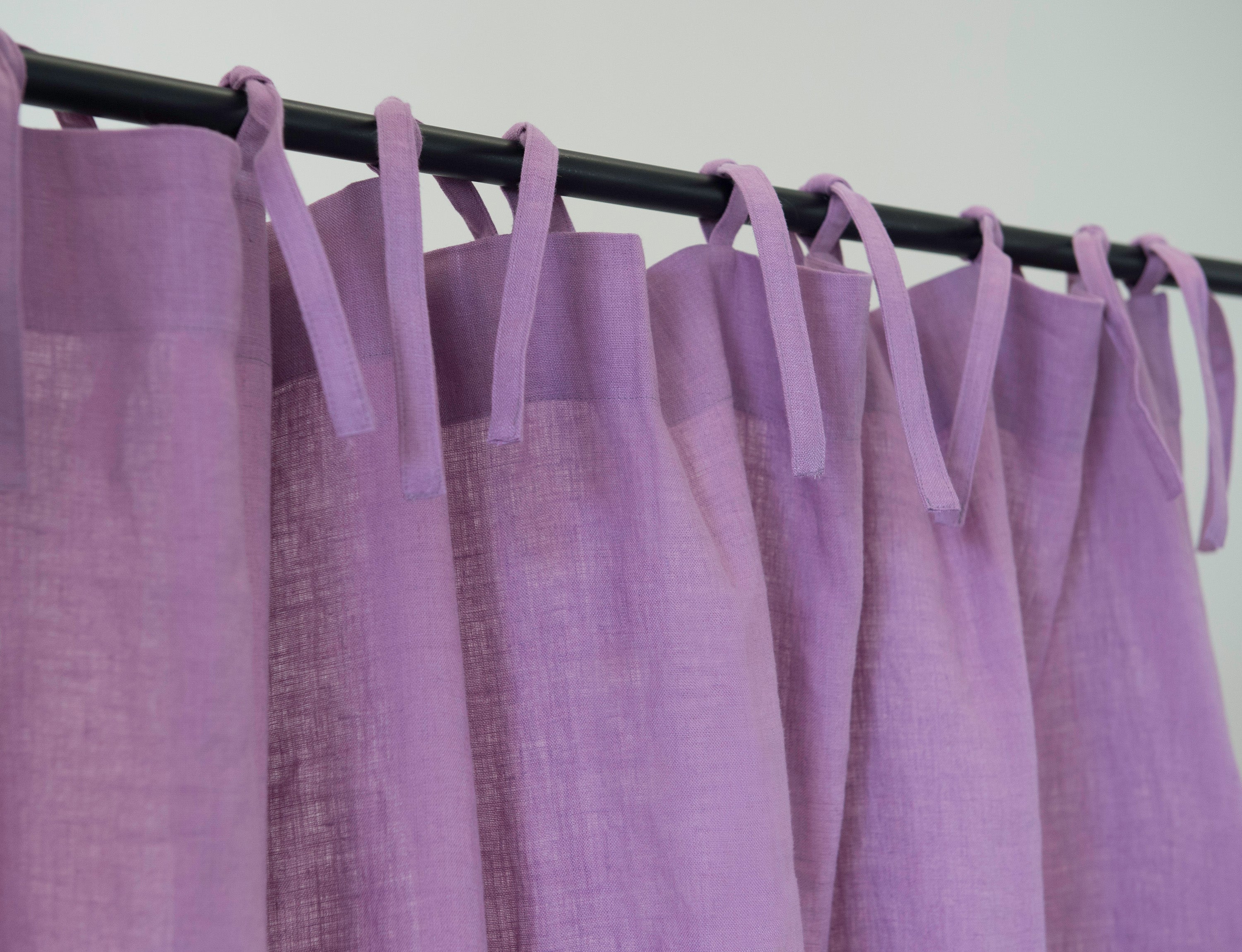 Deep Rose linen curtain with elegant tie tops, showcasing soft fabric and beautiful color.