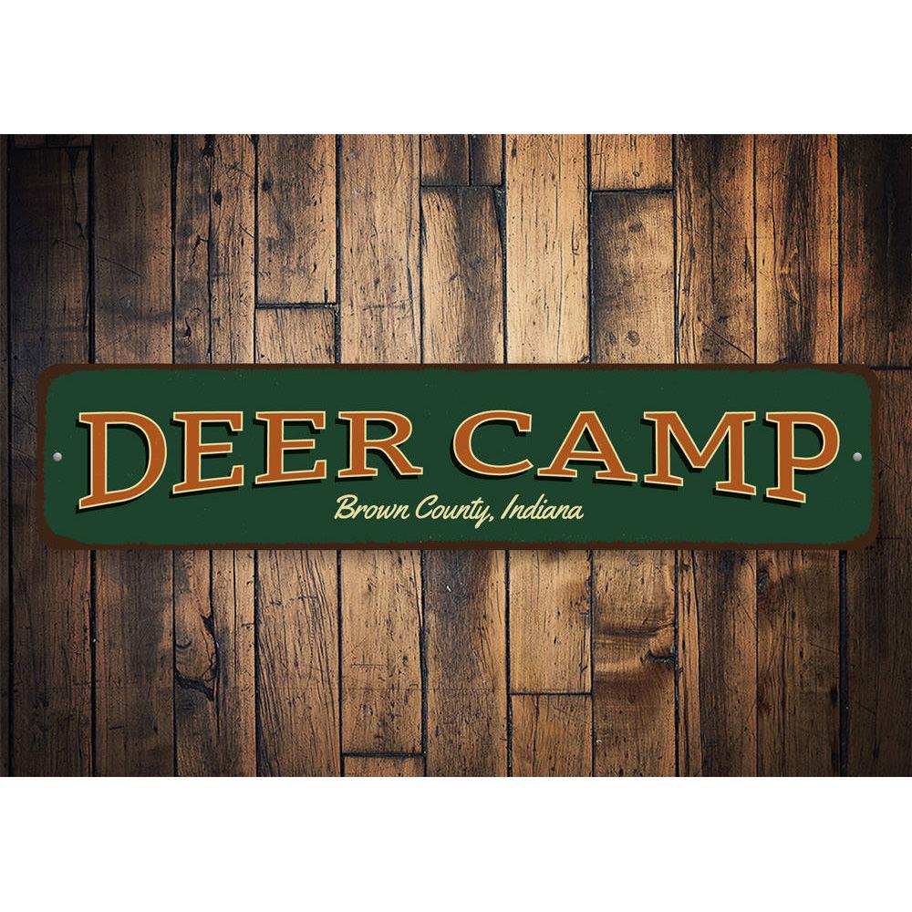 A decorative Deer Camp Sign made of high-quality aluminum, featuring customizable text and pre-drilled holes for easy mounting.