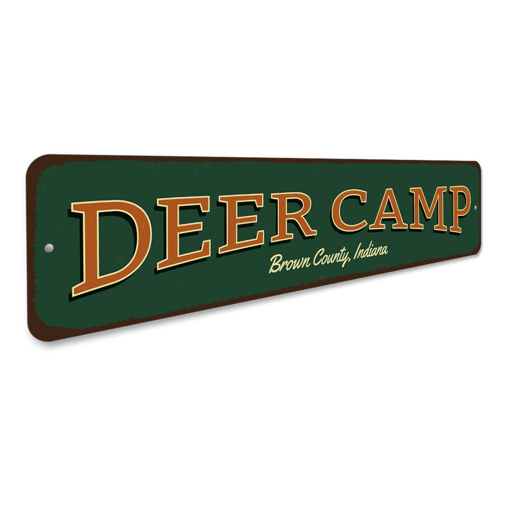 A decorative Deer Camp Sign made of high-quality aluminum, featuring customizable text and pre-drilled holes for easy mounting.