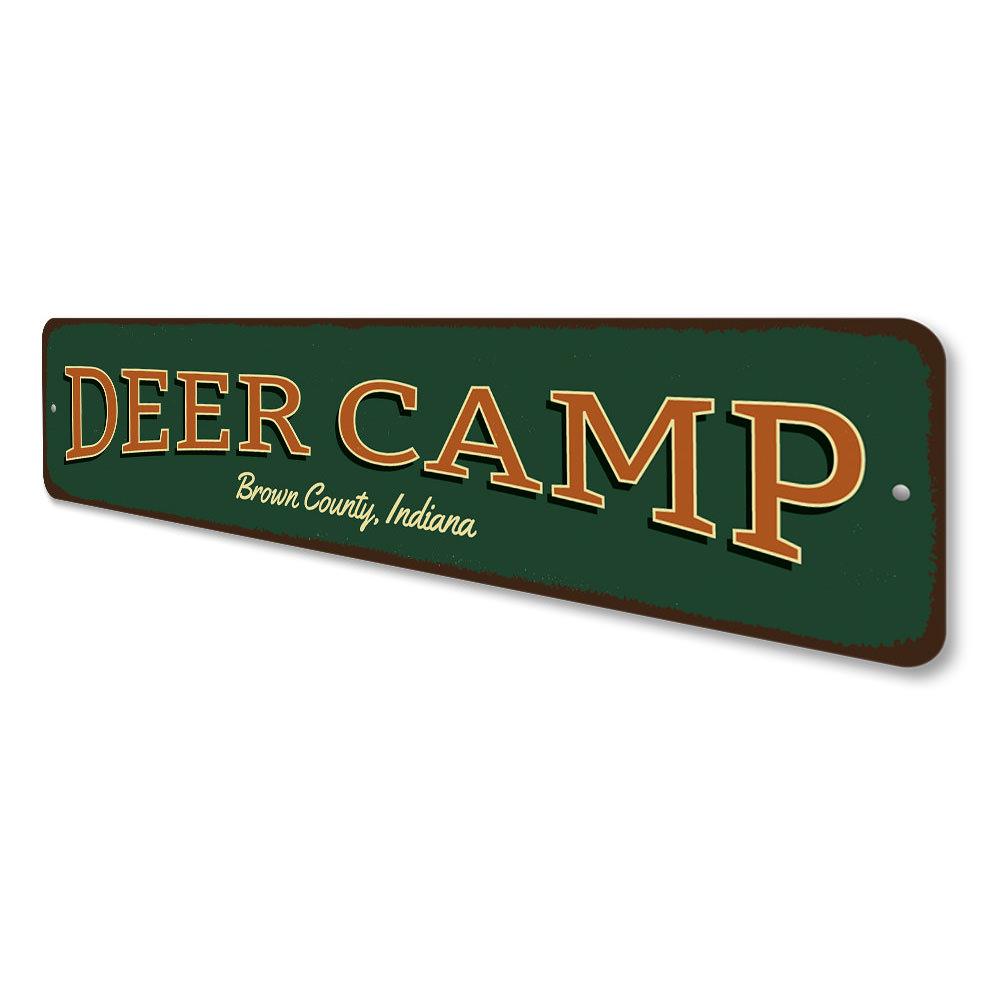 A decorative Deer Camp Sign made of high-quality aluminum, featuring customizable text and pre-drilled holes for easy mounting.