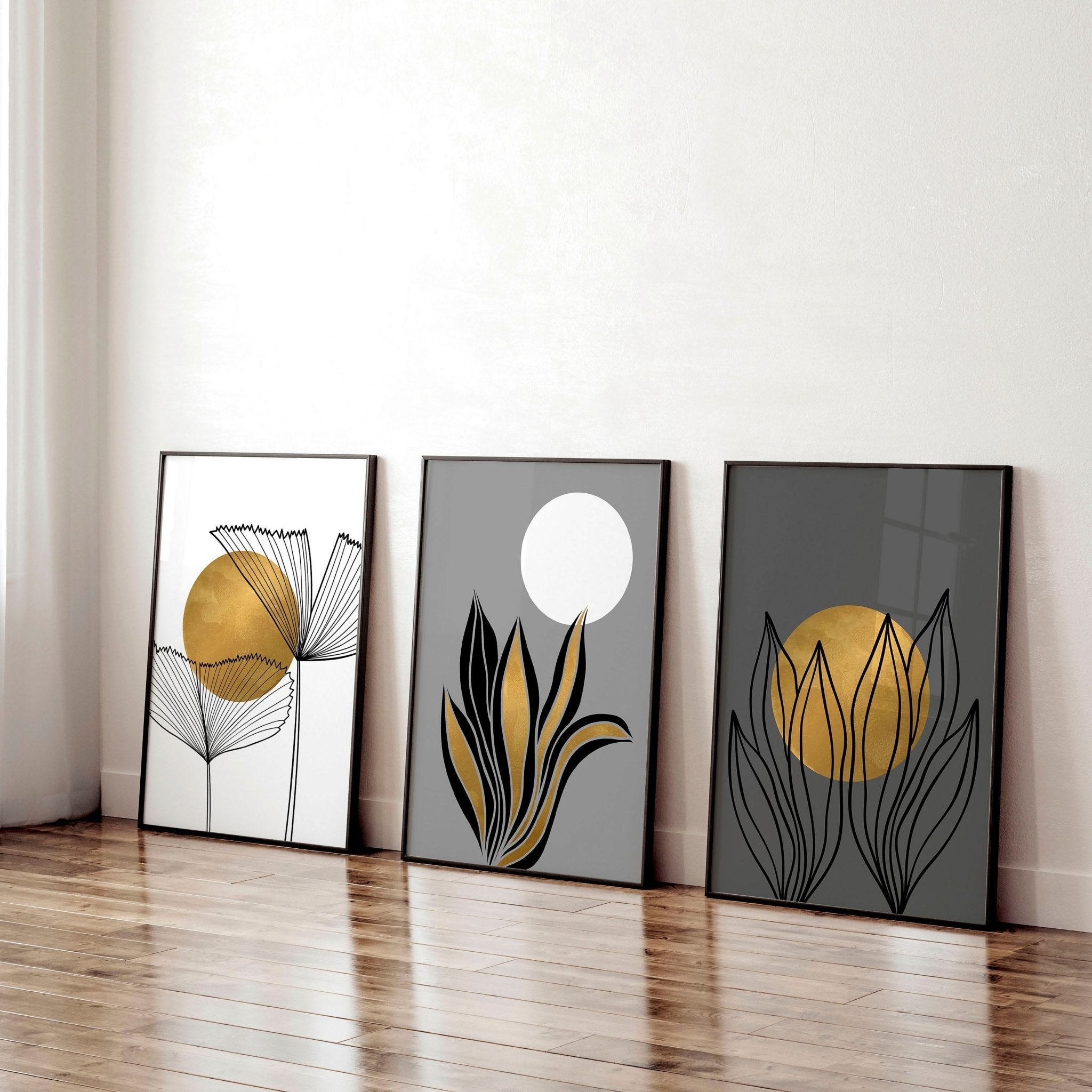 Set of 3 modern botanical wall art prints in grey, gold, and black tones, designed for office desk decor.