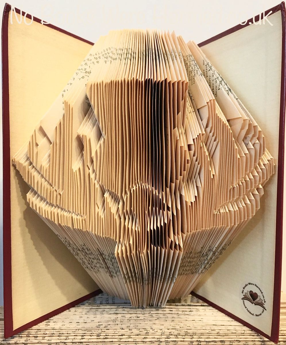 A beautifully crafted Detailed Scottish Thistle made from hand-folded pages of vintage books, showcasing intricate details and unique colors.