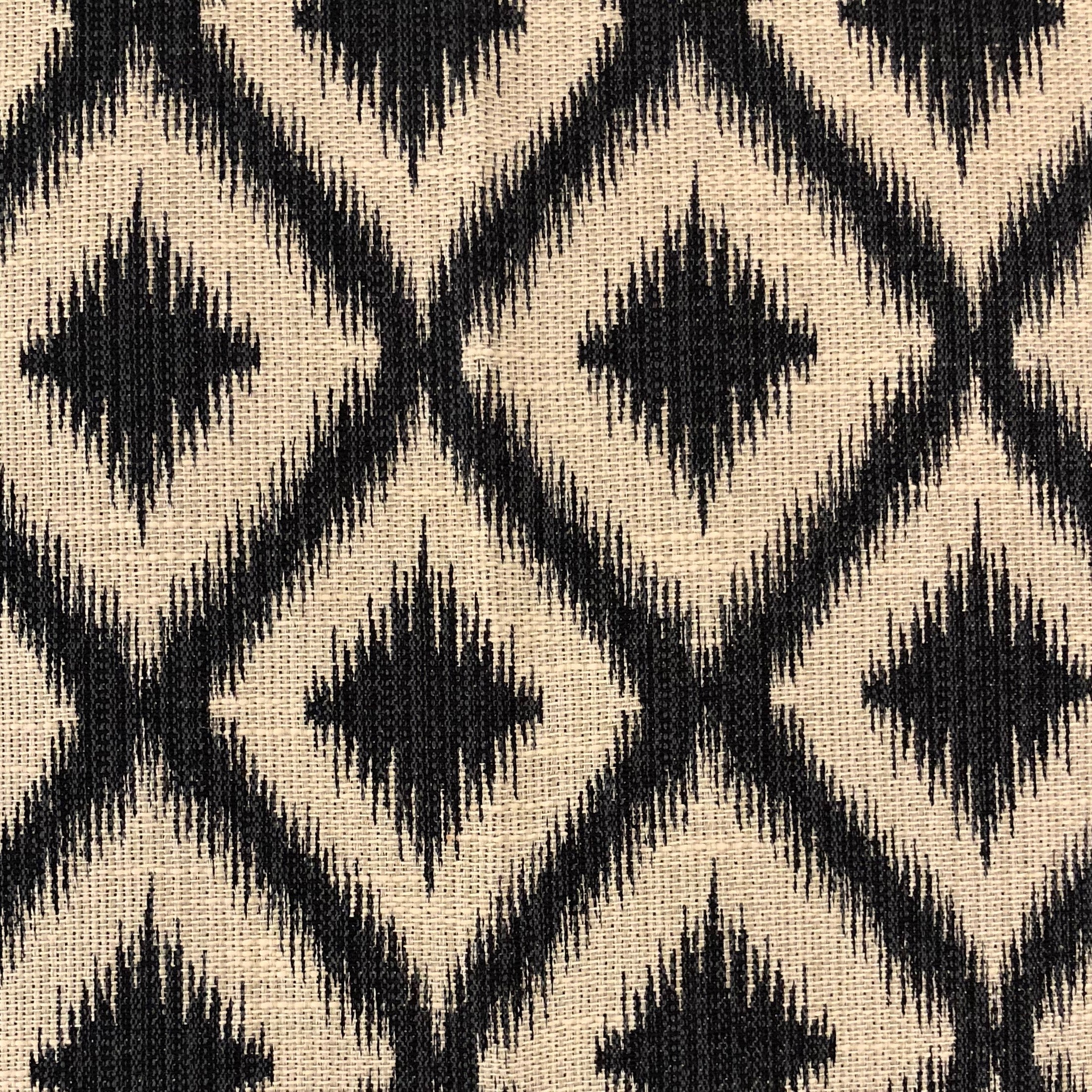 Diamond Embers Gray and Beige Luxury Throw Pillow showcasing elegant ikat pattern and invisible zipper closure.