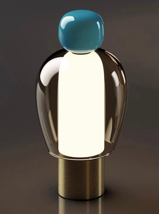 Dimmable Portable Cute Whimsy Eclectic Modern Table Lamp with rounded glass shape and metal base, showcasing a playful design.