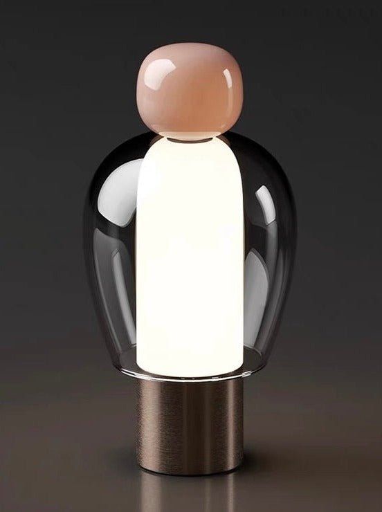 Dimmable Portable Cute Whimsy Eclectic Modern Table Lamp with rounded glass shape and metal base, showcasing a playful design.