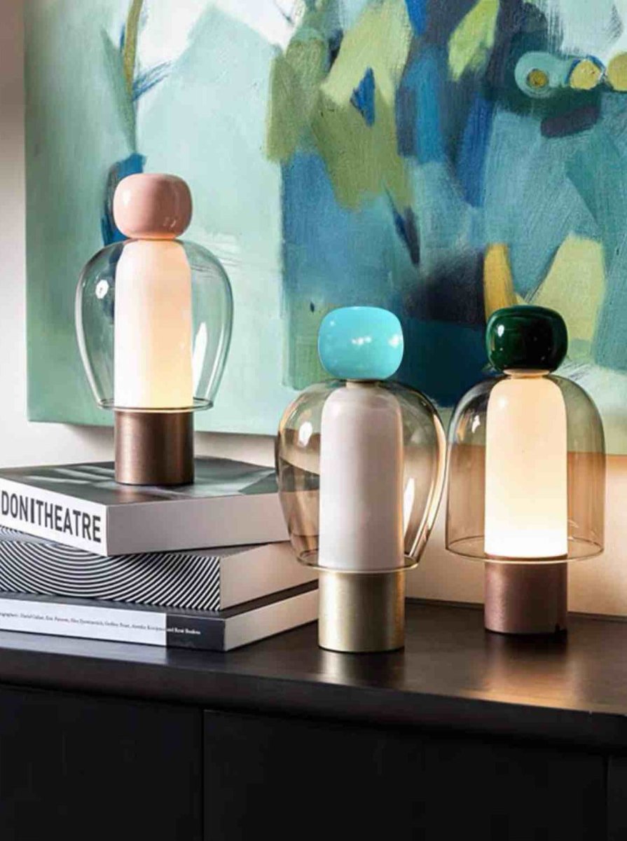 Dimmable Portable Cute Whimsy Eclectic Modern Table Lamp with rounded glass shape and metal base, showcasing a playful design.