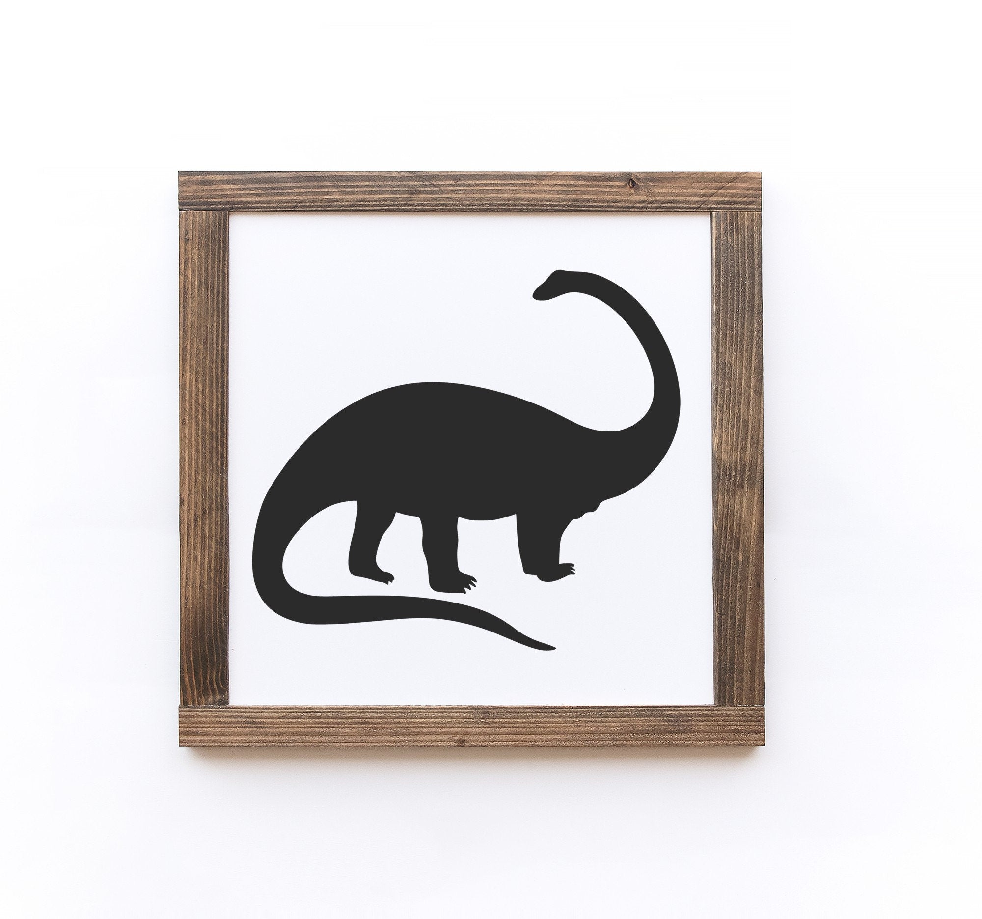 Handmade Dinosaur Wood Signs in matte white finish, showcasing unique wood grain and knots, available in two sizes.