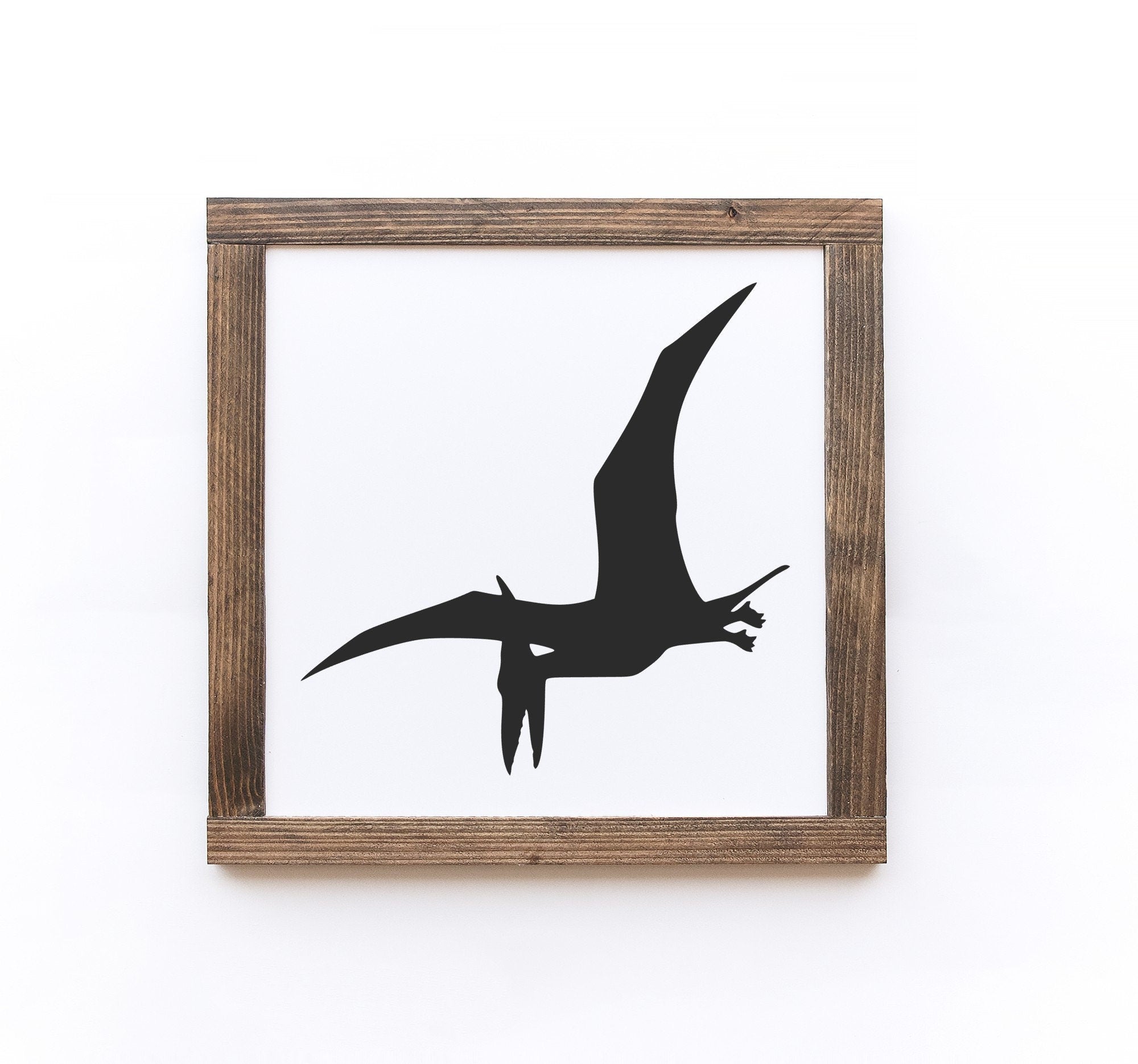 Handmade Dinosaur Wood Signs in matte white finish, showcasing unique wood grain and knots, available in two sizes.