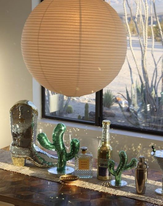 A whimsical Disco Dancing Cactus decor piece, featuring a cute cactus design that dances and shines, perfect for adding fun to any space.