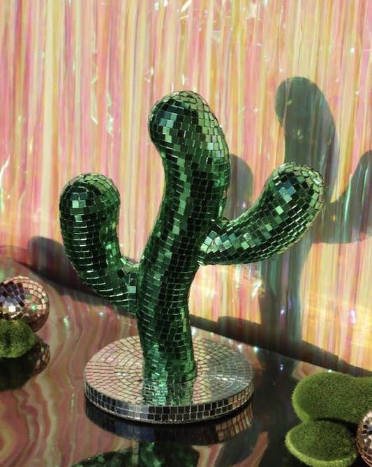 A whimsical Disco Dancing Cactus decor piece, featuring a cute cactus design that dances and shines, perfect for adding fun to any space.