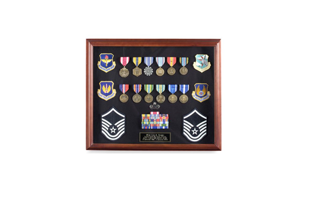 Elegant cherry-finished display case cabinet for military medals, pins, and patches, featuring a reversible black/blue insert.