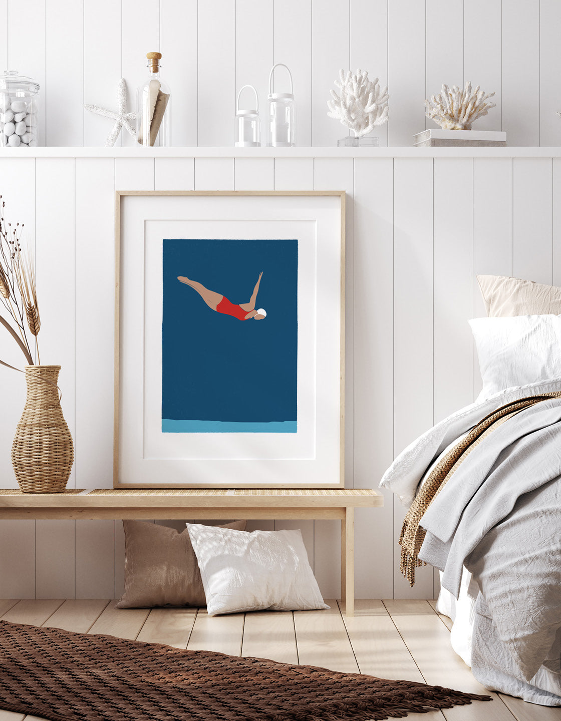 A minimalist art print featuring a diving woman, embodying the essence of the ocean, perfect for coastal decor.