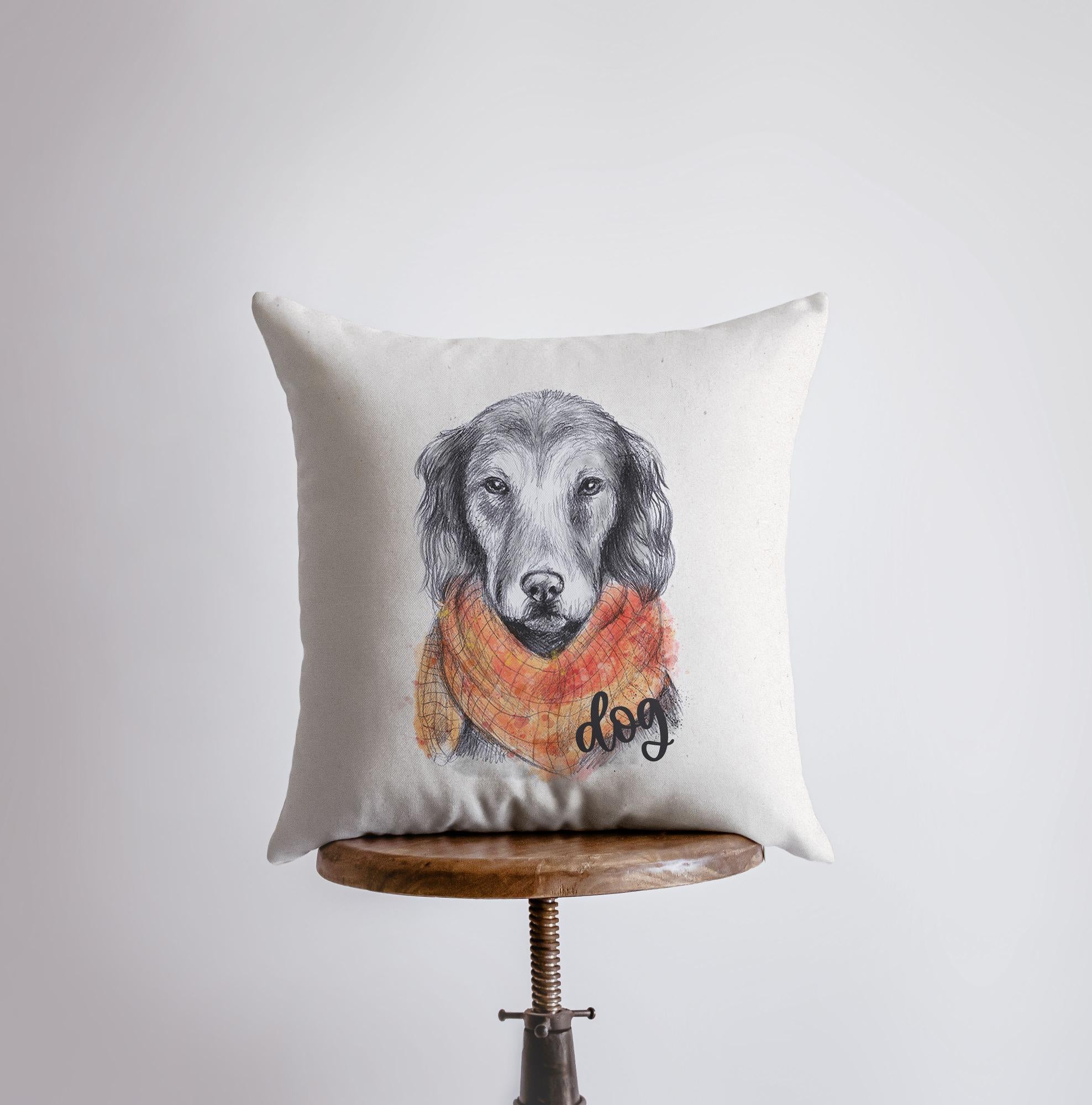 Handmade pillow cover featuring a pencil sketch of a dog with an orange scarf on a beige background.