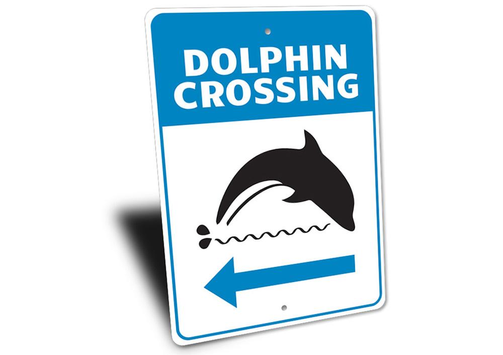 Dolphin Crossing Sign made of aluminum, featuring vibrant colors and a beach-themed design, perfect for coastal decor.