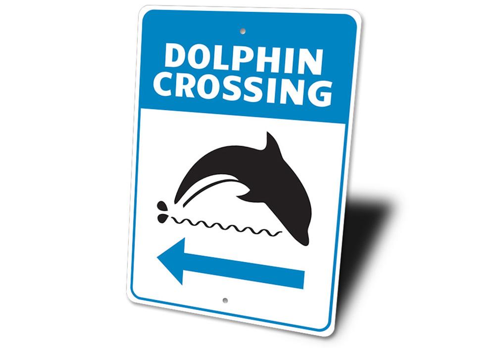 Dolphin Crossing Sign made of aluminum, featuring vibrant colors and a beach-themed design, perfect for coastal decor.