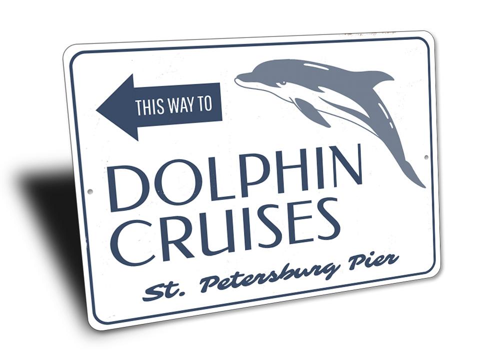 Dolphin Cruises This Way Sign made of aluminum, featuring vibrant colors and customizable text, perfect for beach-themed decor.