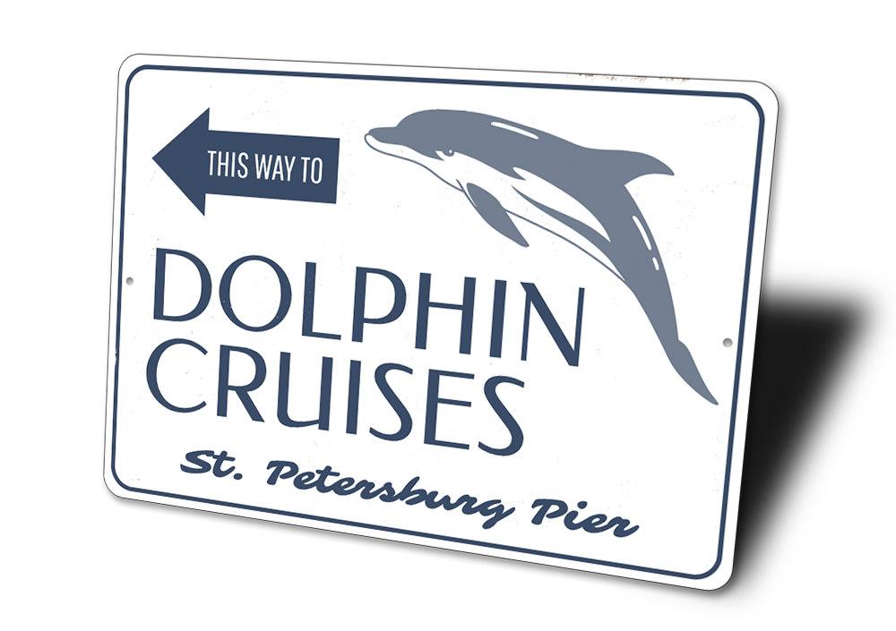 Dolphin Cruises This Way Sign made of aluminum, featuring vibrant colors and customizable text, perfect for beach-themed decor.