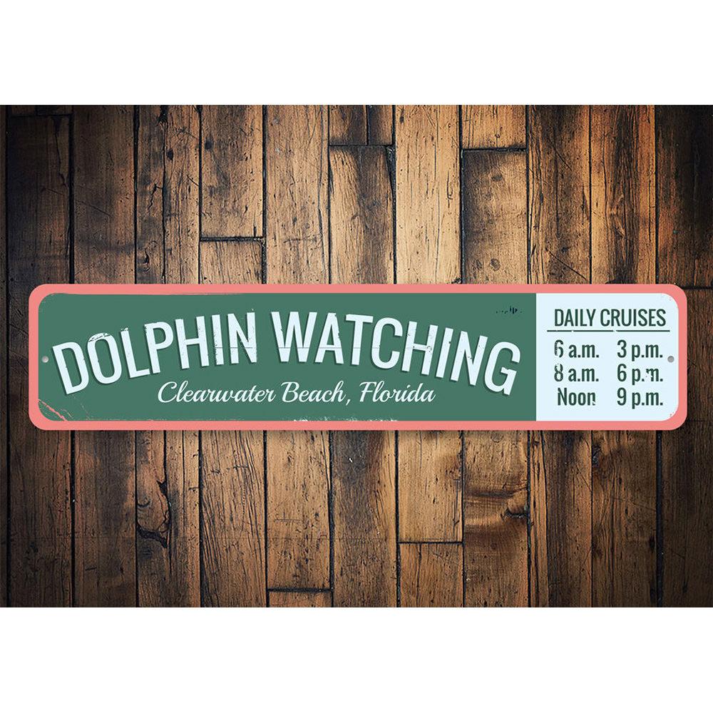 A vibrant Dolphin Watching Sign made of high-quality aluminum, featuring a beach-themed design perfect for coastal decor.