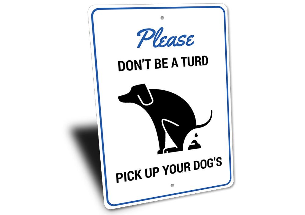 A humorous 'Don't Be a Turd' decorative sign made of aluminum, featuring a playful design suitable for home decor.