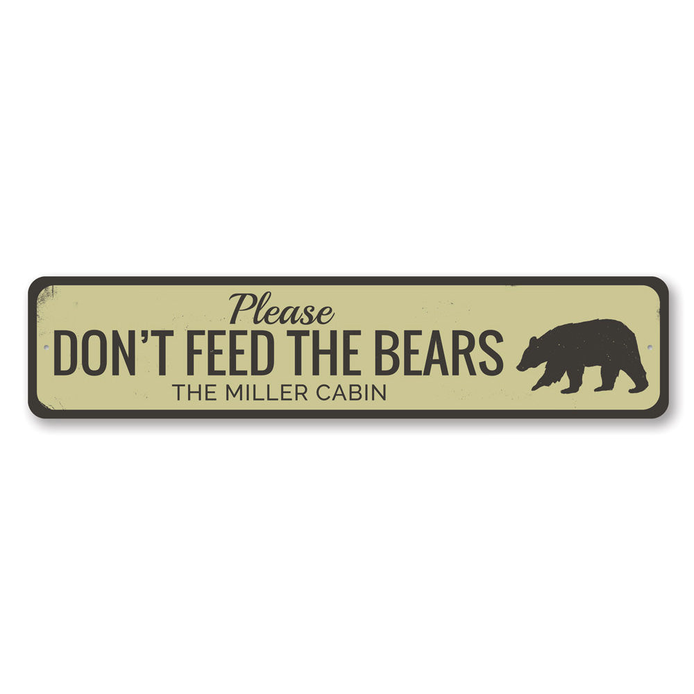 A decorative 'Don't Feed Bears' sign made of high-quality aluminum, featuring a rustic design suitable for lakehouse decor.