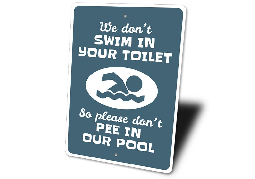 A humorous Don't Pee in the Pool Sign made of durable aluminum, featuring bold text and a colorful design, perfect for poolside decoration.