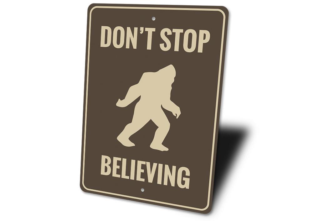 Dont Stop Believing Bigfoot Sign made of aluminum, featuring a whimsical design perfect for home decor.