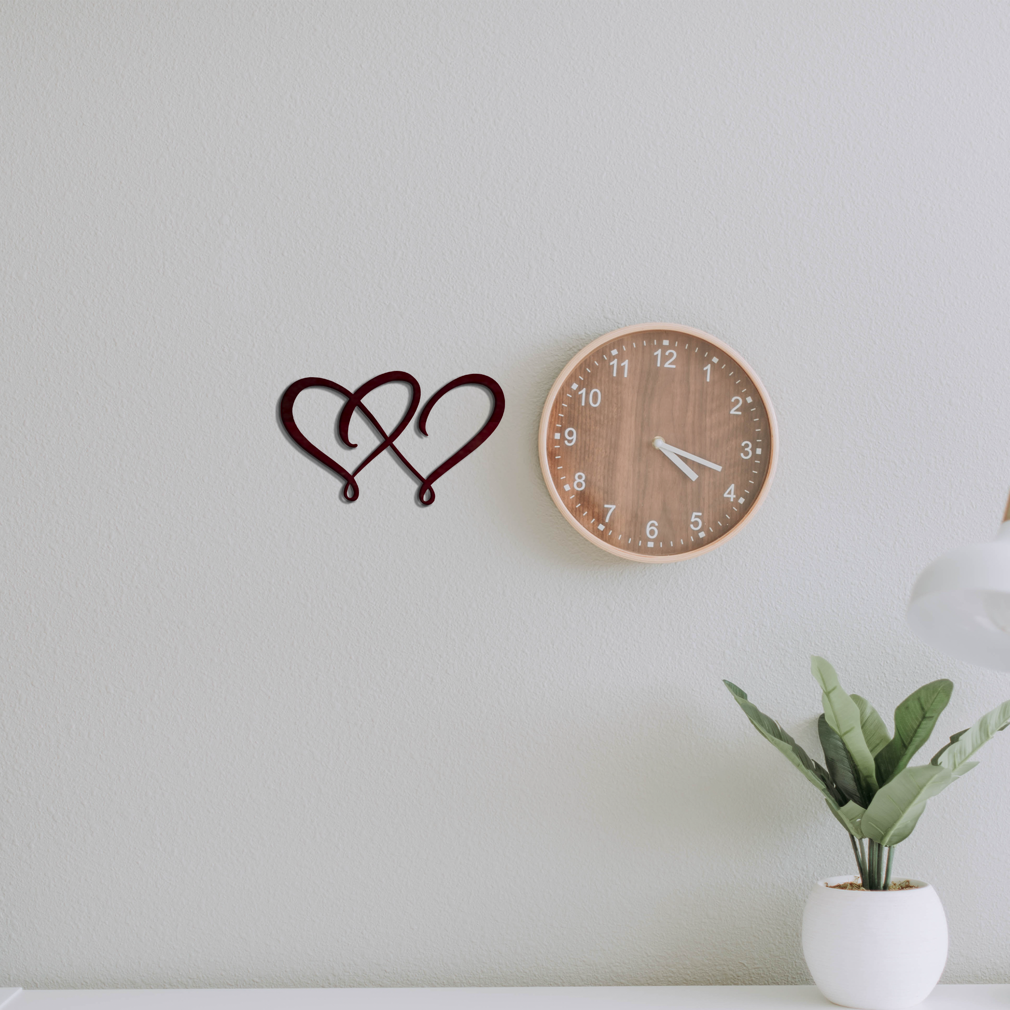 Double Heart Metal Wall Art crafted from high-quality steel, featuring a low gloss finish, symbolizing love and connection.