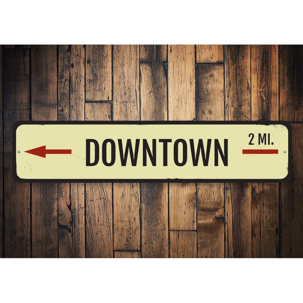 Downtown Mileage Sign made of high-quality aluminum, customizable with personal text, featuring pre-drilled holes for easy mounting.