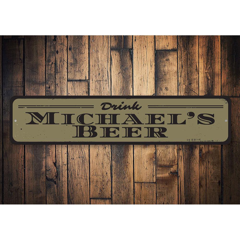 A decorative Drink Beer Sign made of high-quality aluminum, featuring customizable text, ideal for home bars and man caves.