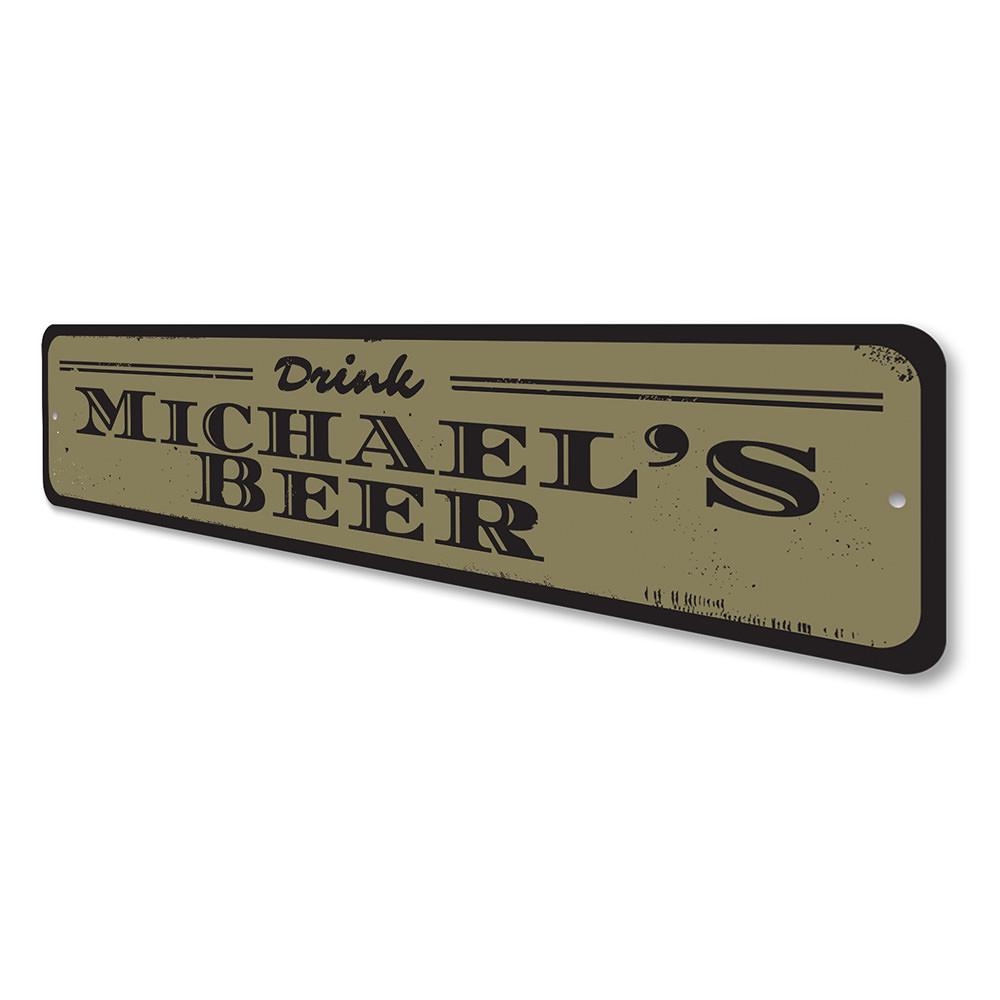 A decorative Drink Beer Sign made of high-quality aluminum, featuring customizable text, ideal for home bars and man caves.